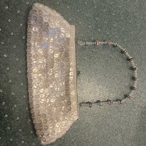 Classy clasp purse with beaded strap